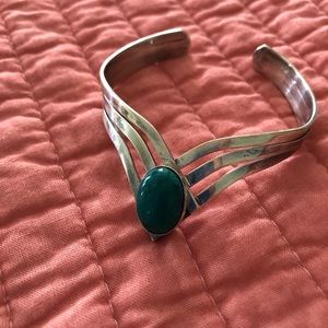 Multiple items. 2 brooches and one bracelet